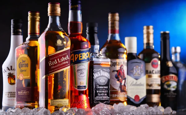 depositphotos_332193256-stock-photo-bottles-of-assorted-global-liquor